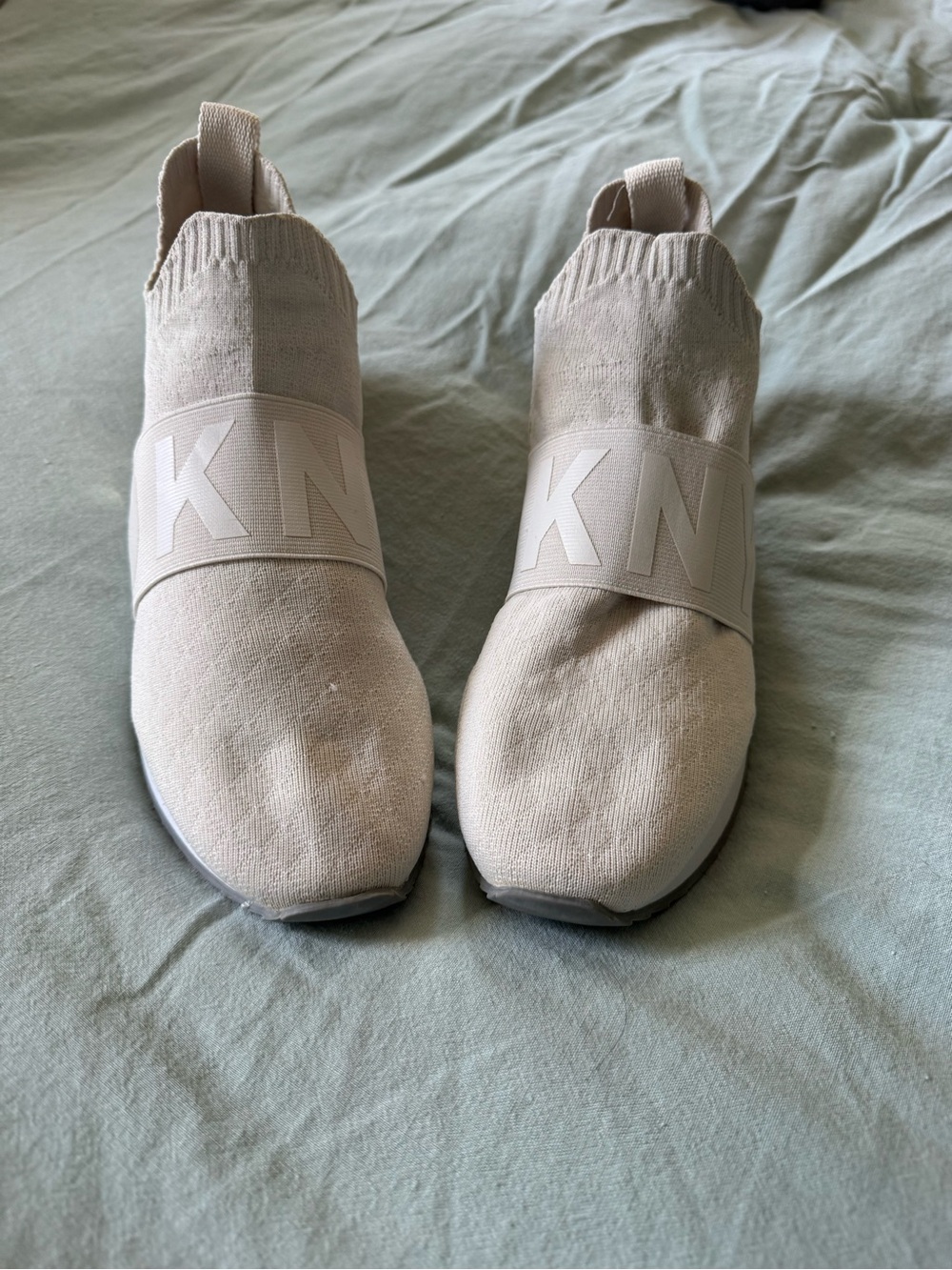 DKNYC Cream Knit Slip-On Sneakers with Elastic Logo Strap